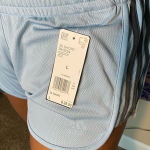 Adidas baby blue pants with grey strips